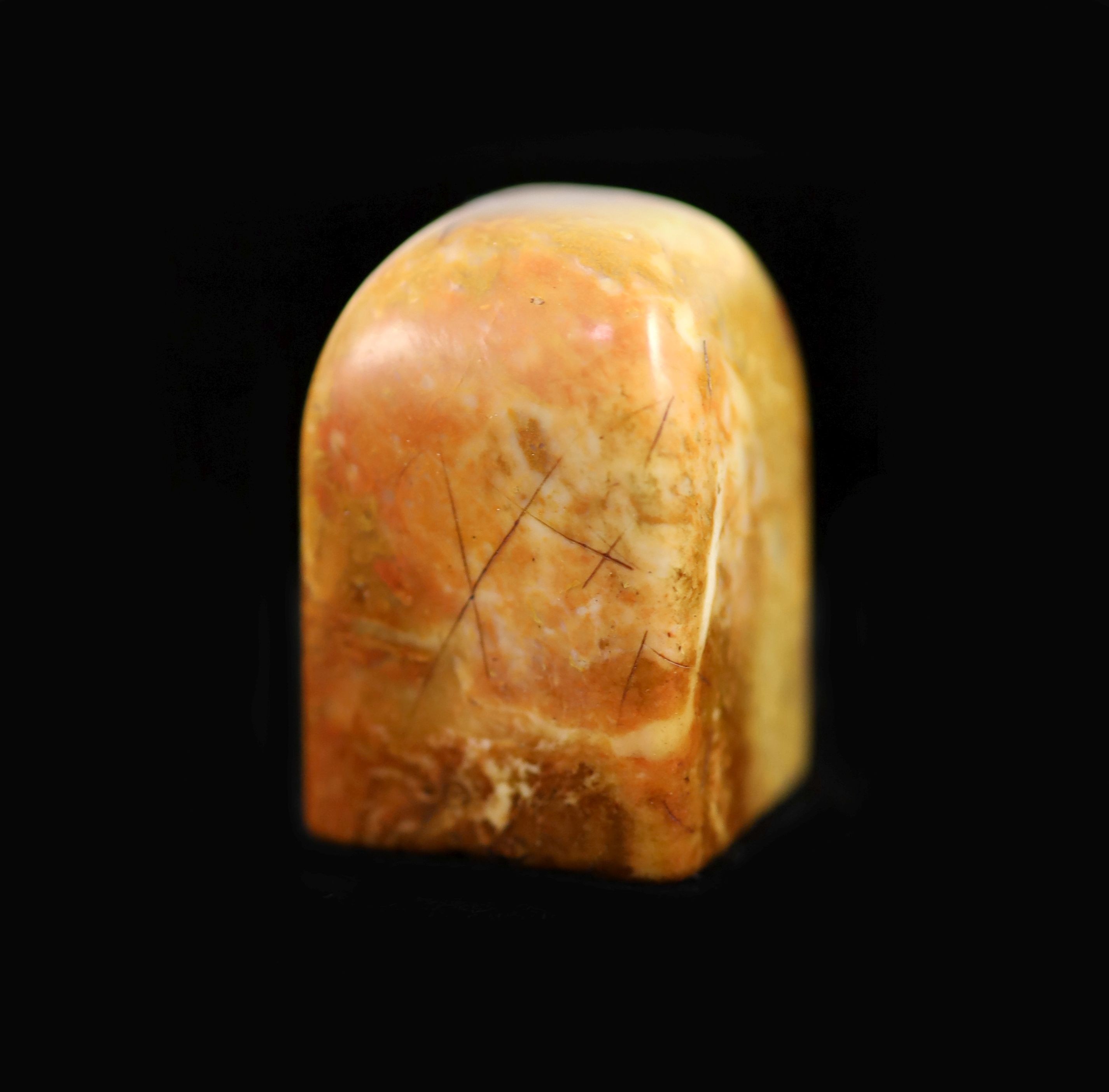 A Chinese cream and russet soapstone square seal, 3.8 cm